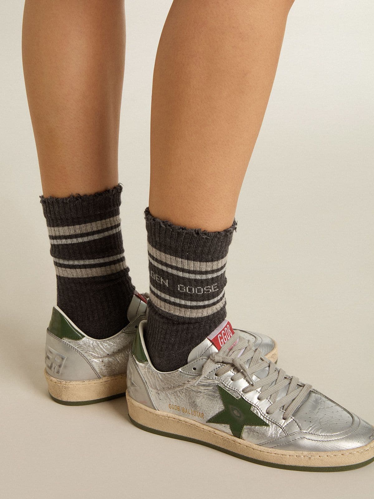 Golden Goose - Dark grey socks with distressed details and cream and worn-white stripes in 