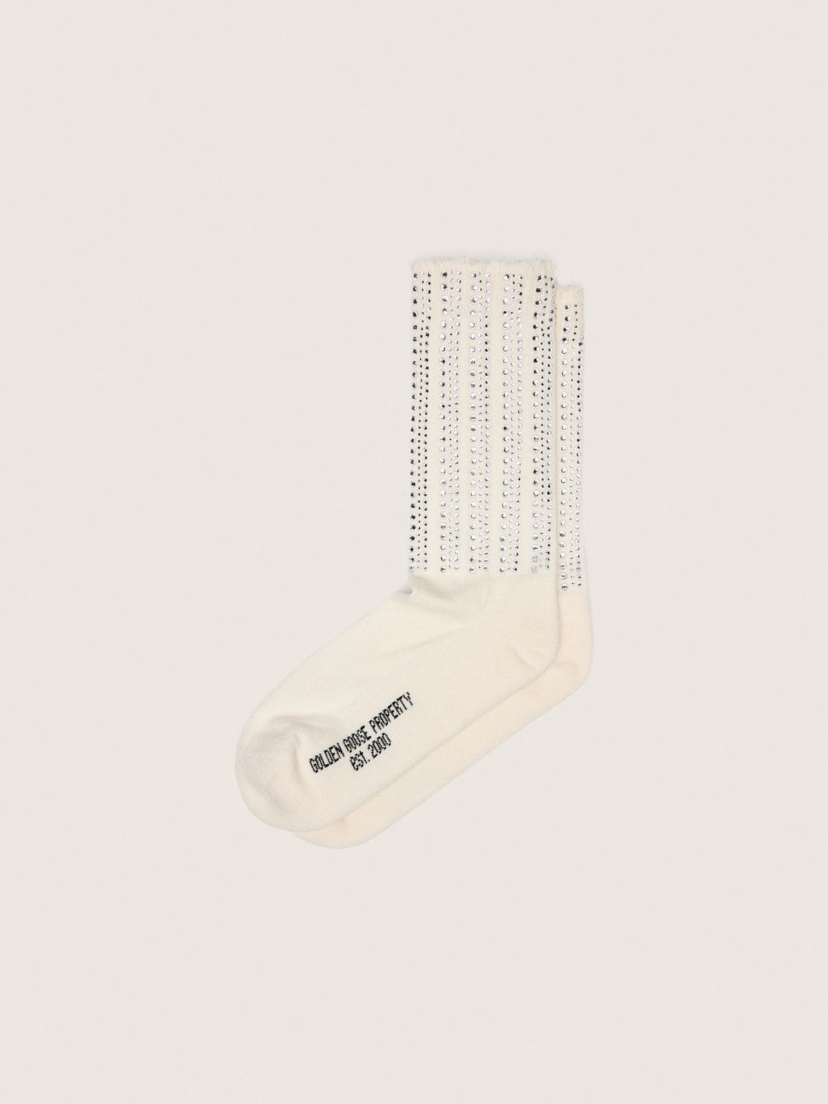 Calcetines color nata con detalles desgastados y strass aplicados
