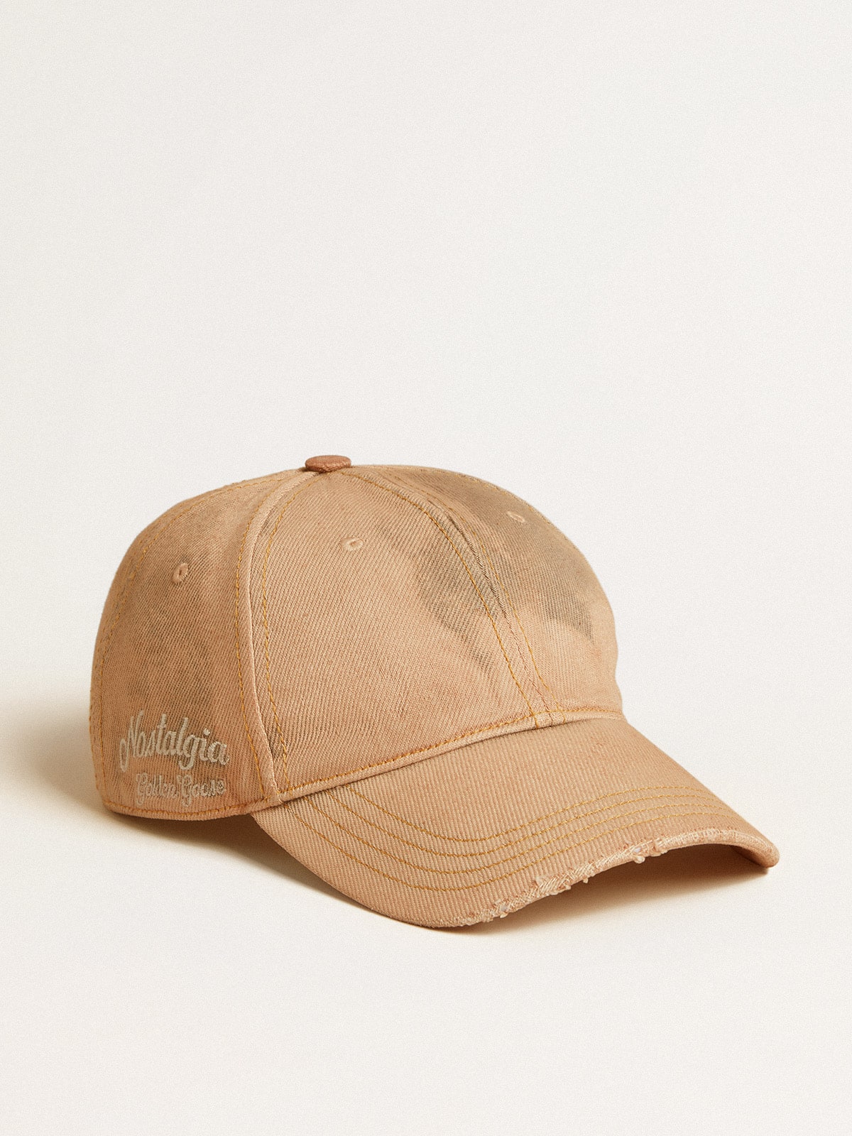 Beige baseball cap with a lived-in finish