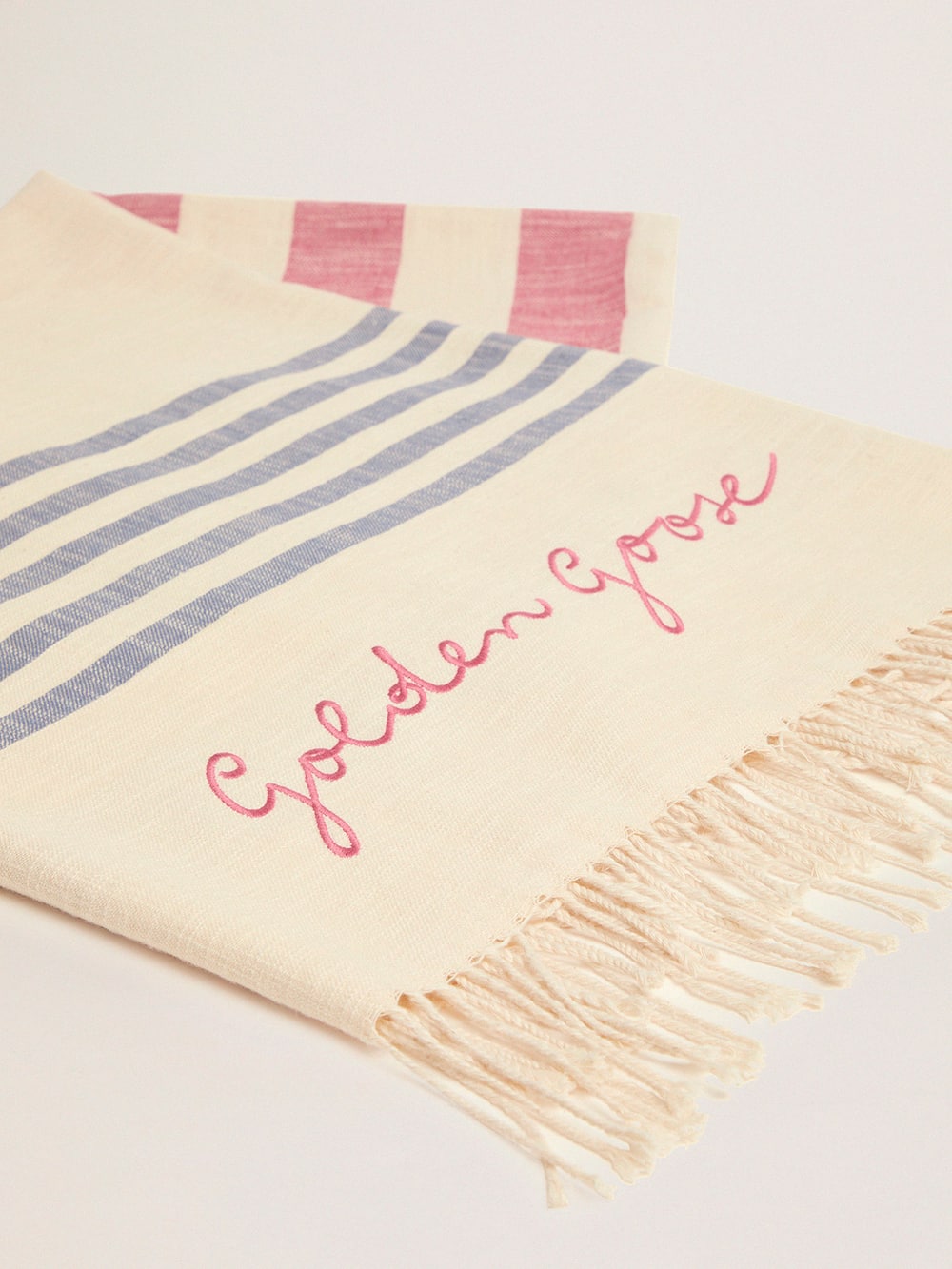 Golden Goose - Egeo Golden Resort Capsule Collection cotton beach towel in vintage white with red and blue stripes and braided fringes at the bottom in 