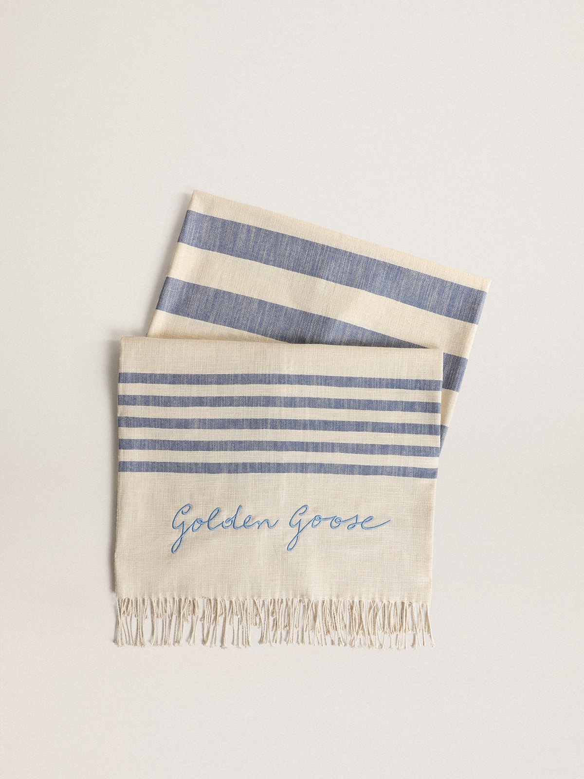 Golden Goose - Resort Collection cotton beach towel with blue stripes and fringing    in 