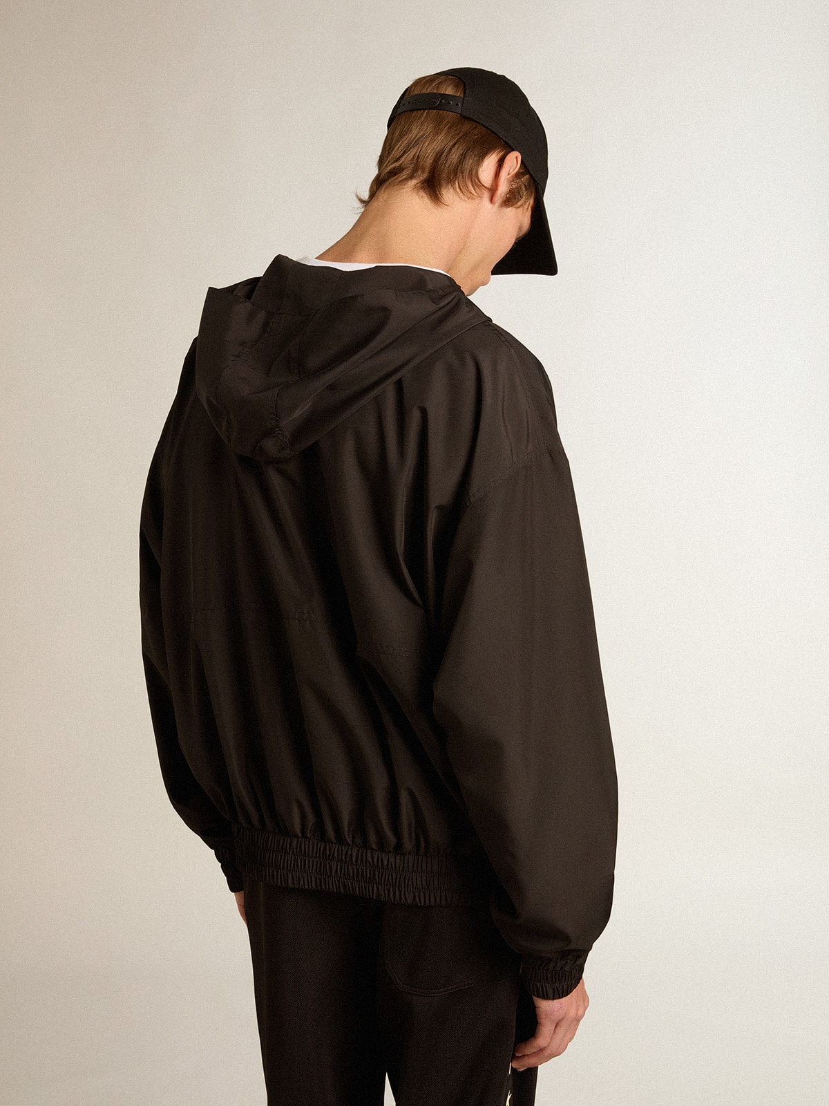 Black windbreaker with hood | Golden Goose