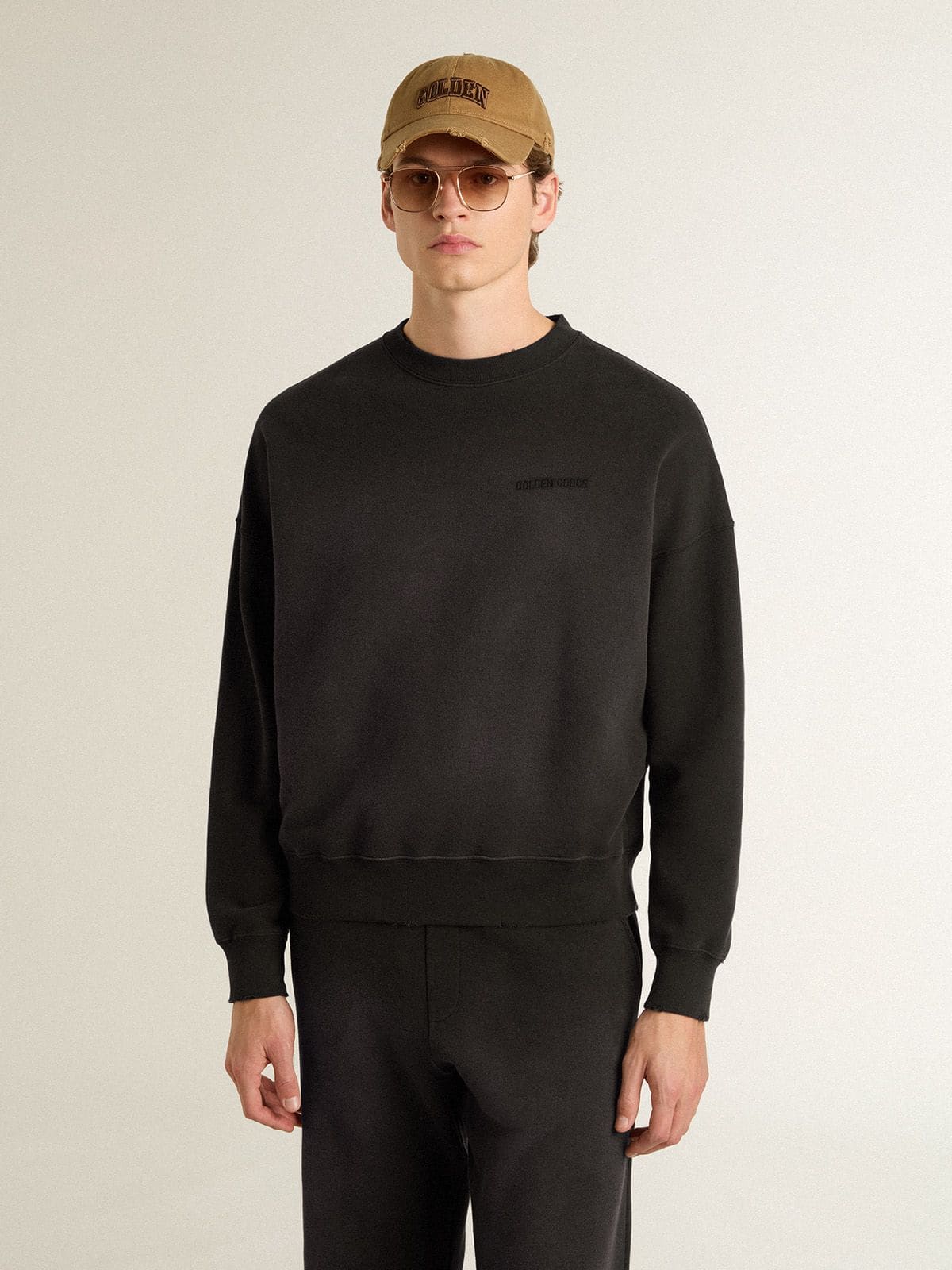 Golden Goose - Unisex sweatshirt in worn black cotton with logo embroidery in 