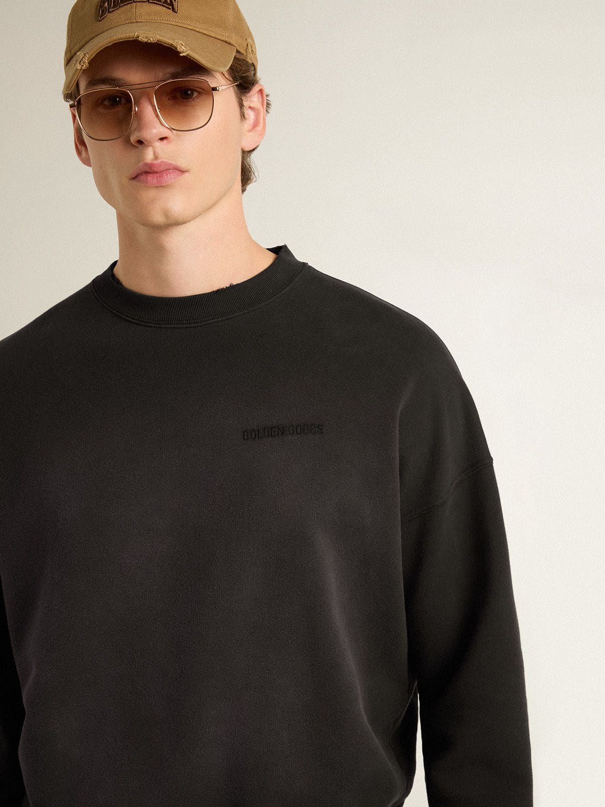 Golden Goose - Unisex sweatshirt in worn black cotton with logo embroidery in 