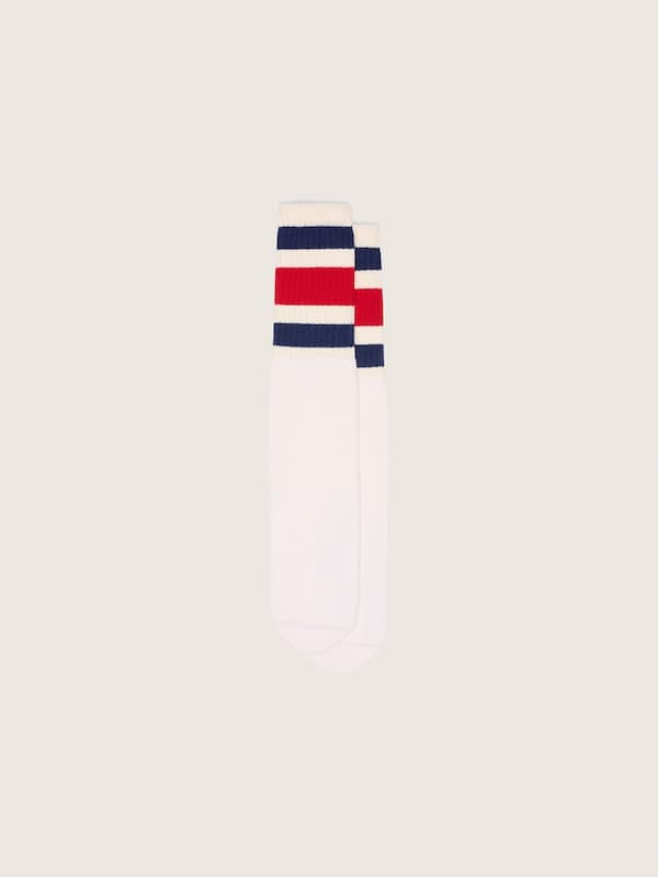 Worn-white socks with blue and red stripes