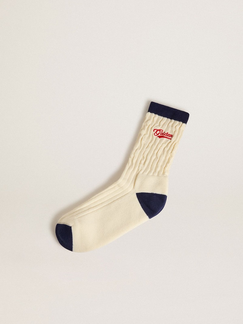 Cream ribbed socks with navy blue details and red logo