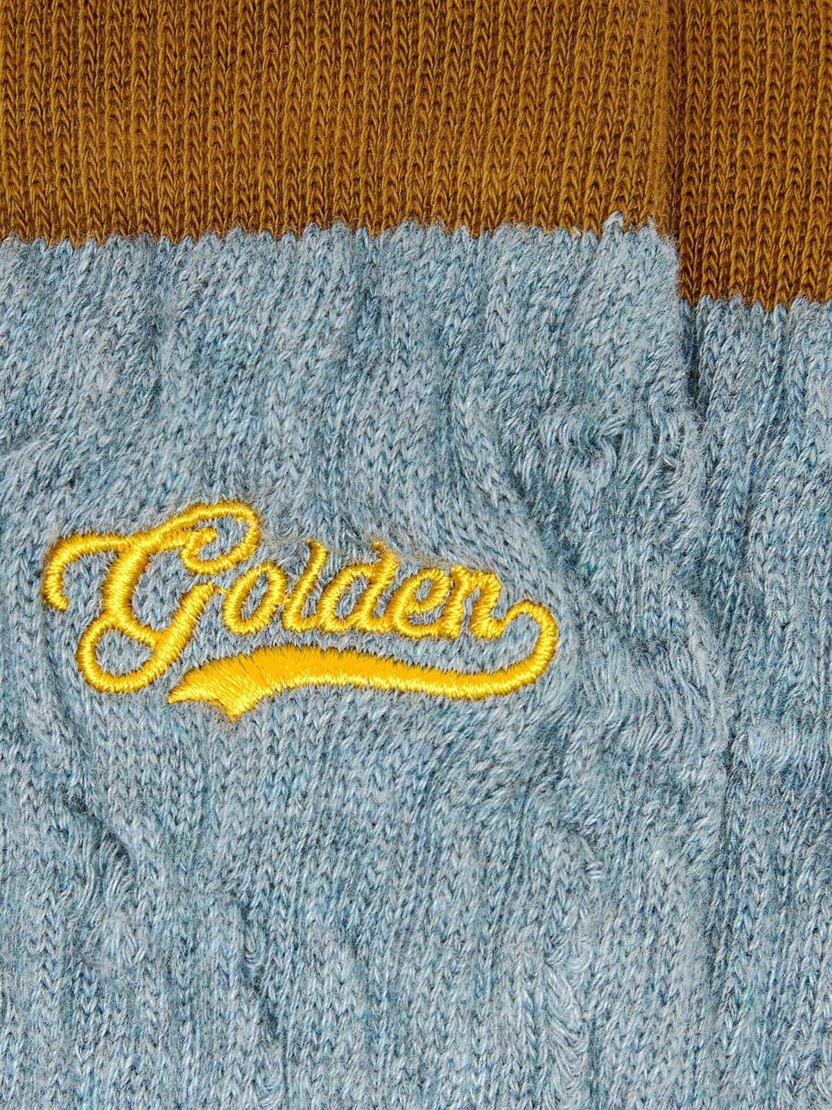 Chaussettes c&ocirc;tel&eacute;es bleu ciel avec d&eacute;tails bruns et logo jaune