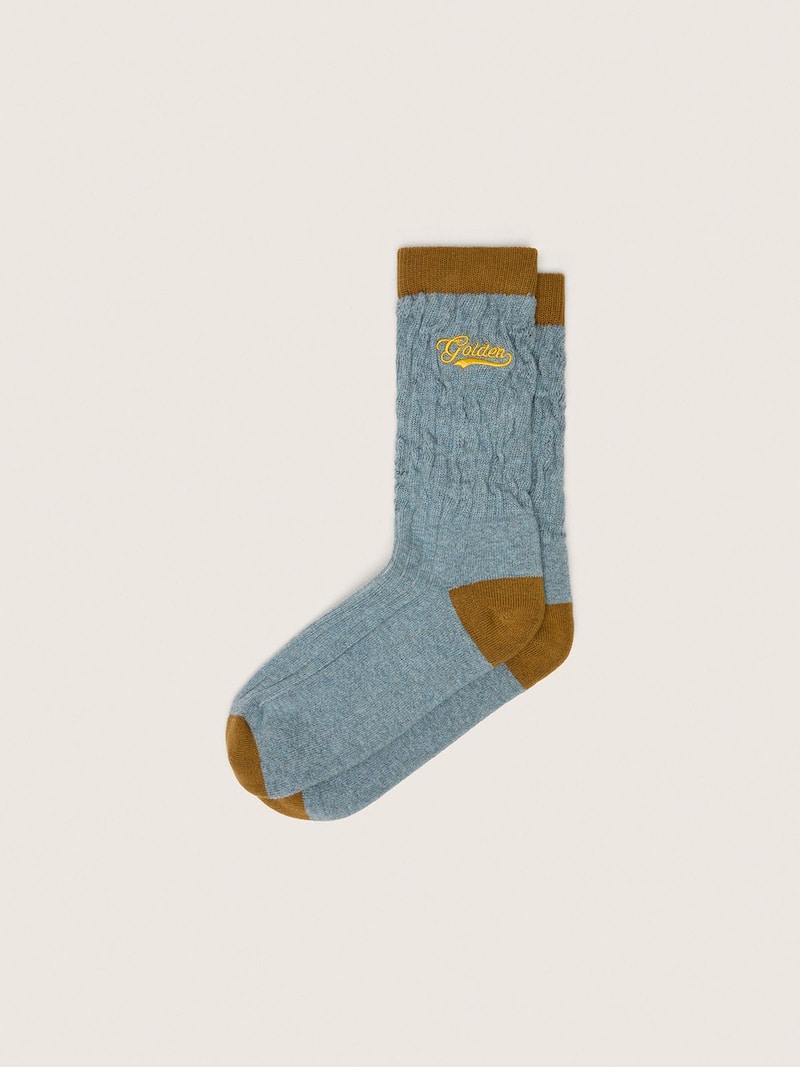 Chaussettes c&ocirc;tel&eacute;es bleu ciel avec d&eacute;tails bruns et logo jaune