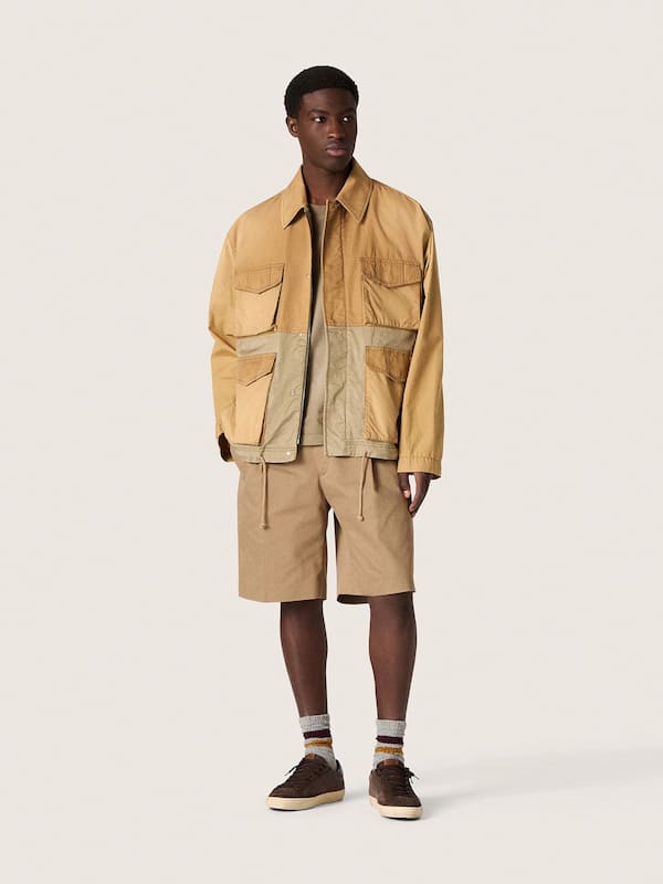 Unisex safari jacket in beige and military-green cotton with maxi pockets