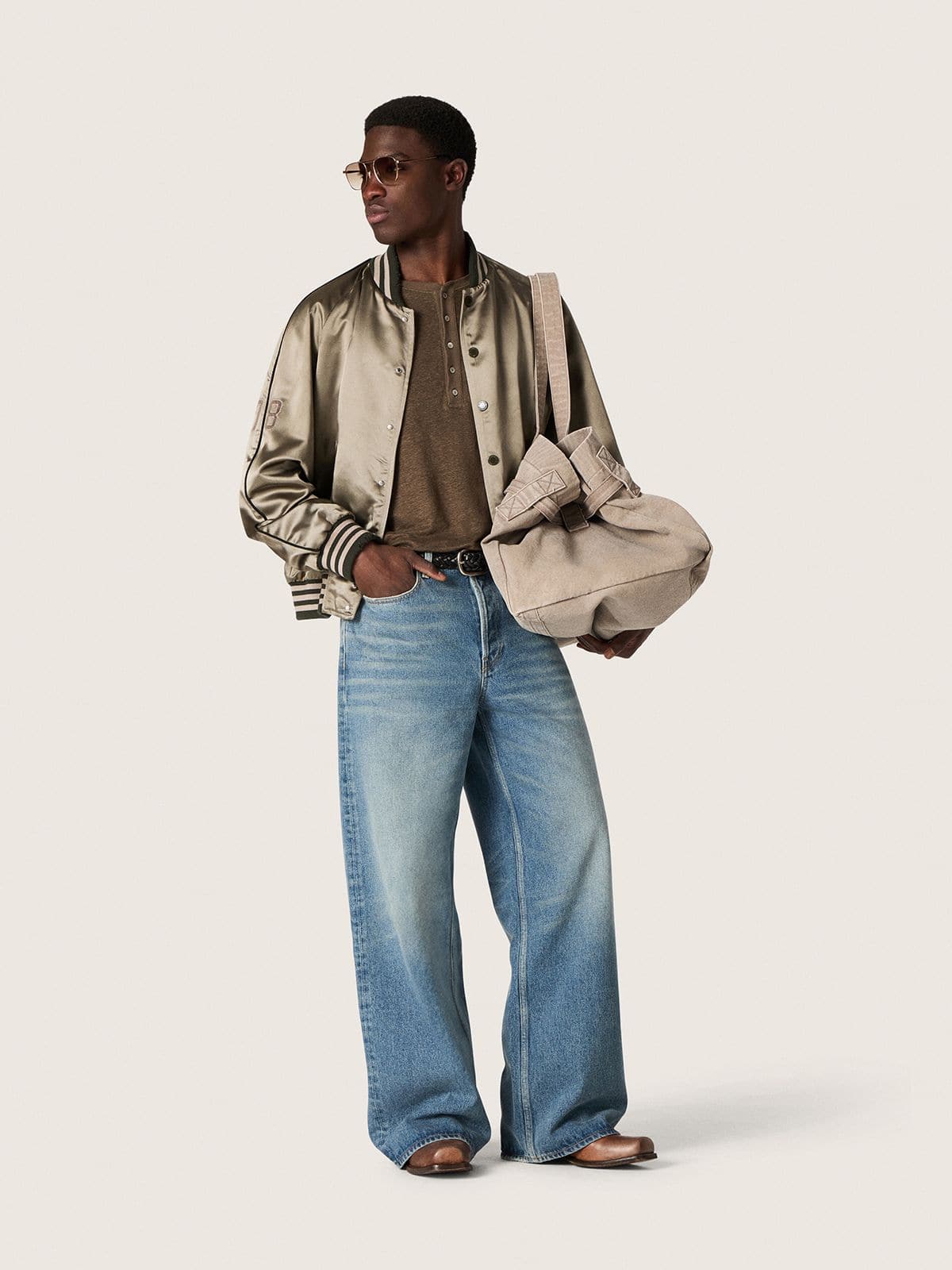 Unisex bomber jacket in green satin with ribbed hems and collar