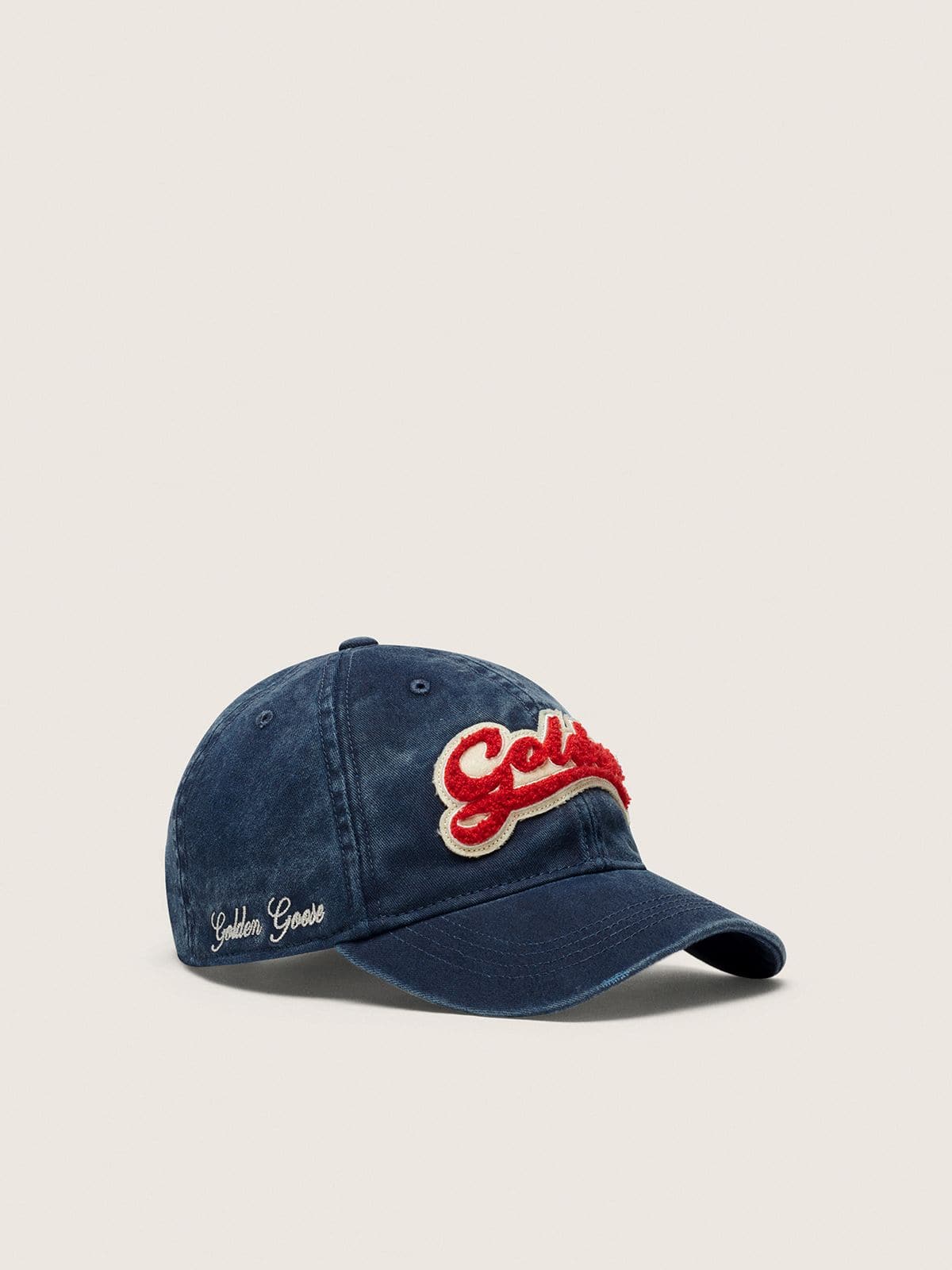 Gorra de b&eacute;isbol de color vaquero azul con parche &laquo;Golden&raquo; de rizo de color rojo y blanco