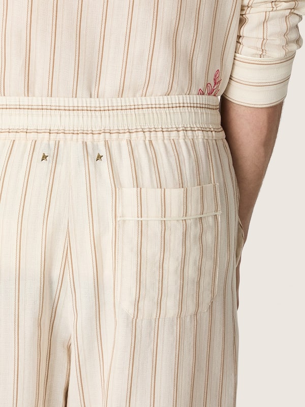 Golden Goose - Pantaloni jogging unisex in cotone e lino a righe &eacute;cru e sabbia in 