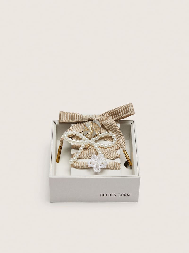 Skins "Sparkling" beige embroidered laces embellished with beaded charms and gold charm