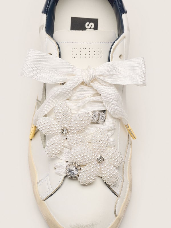 Skins "Sparkling" cream striped laces with beaded charms and crystal charms
