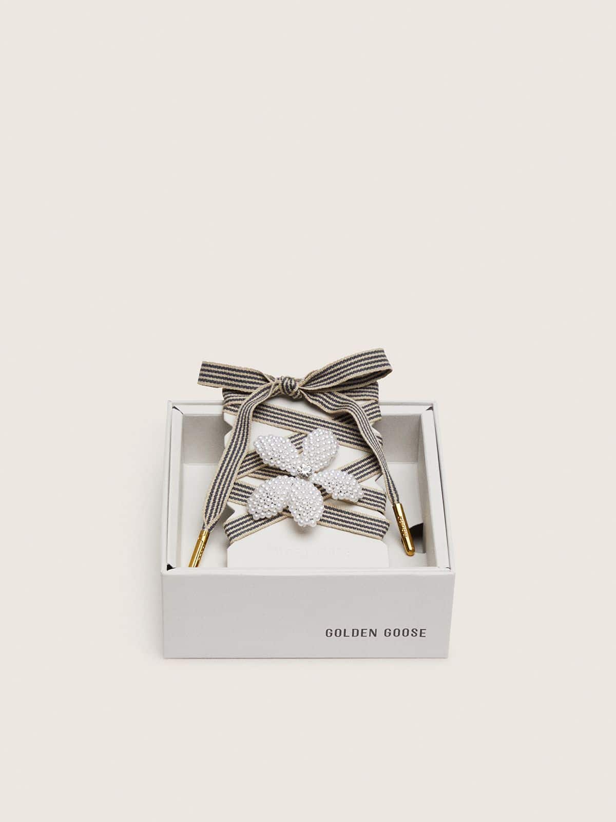 Golden Goose - Skin "Vintage" laccio a righe nere e beige con charm a forma di fiore in 