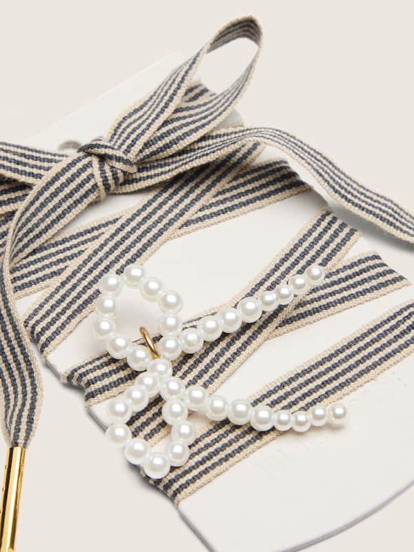 Golden Goose - Skins "Vintage" black and beige striped laces with beaded bow charm in 