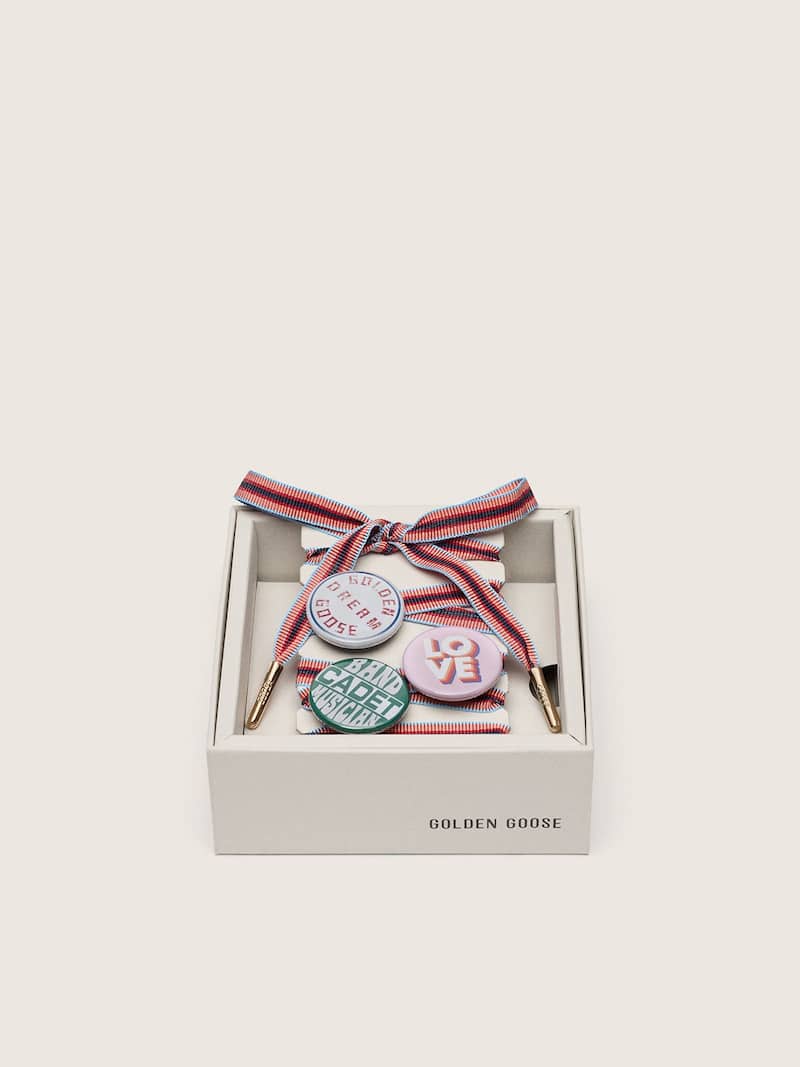 Skins multicolor laces with turtle charm and pins