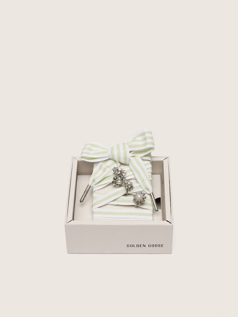Skins green and white striped laces with jewel charms