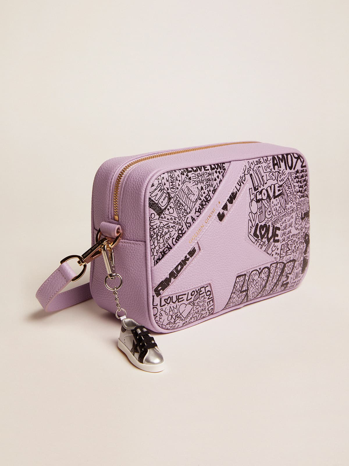 Golden Goose - Lilac hammered leather Star Bag with tone-on-tone leather star and black all-over graffiti print in 