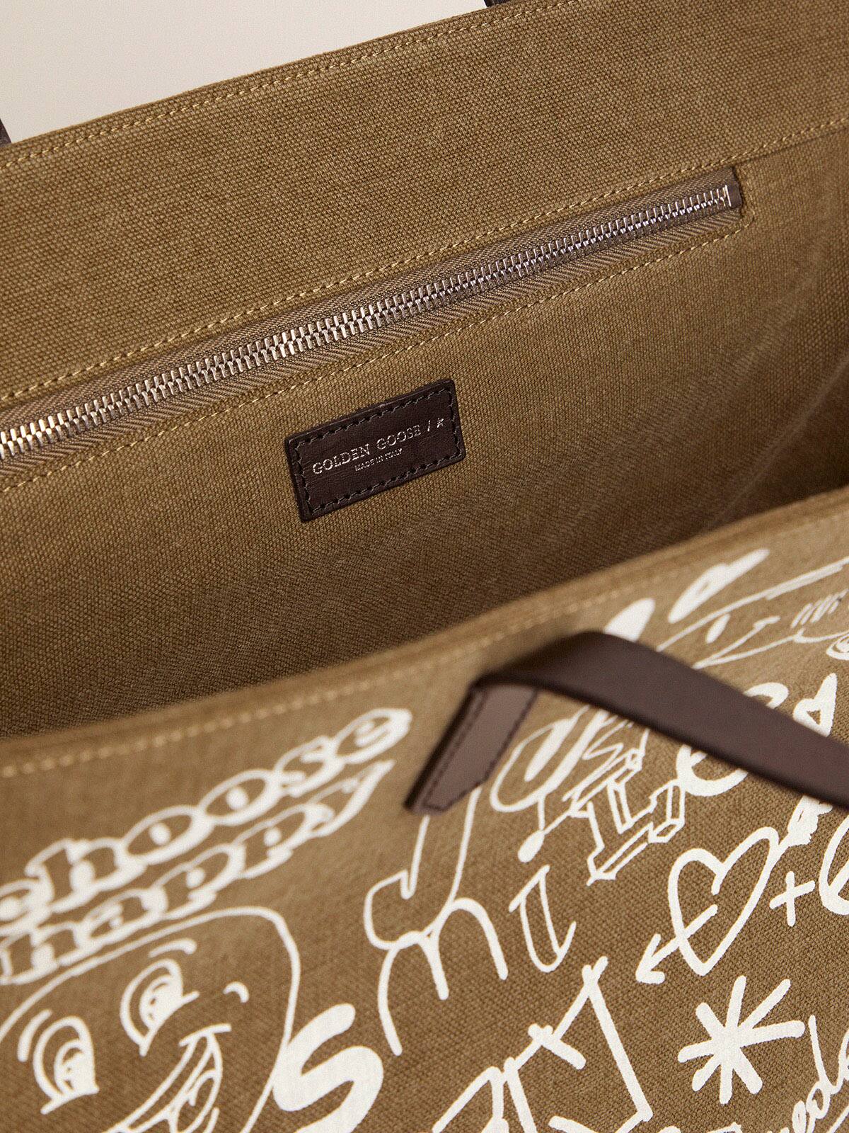 Golden Goose - East-West California Bag in military green canvas with graffiti in 