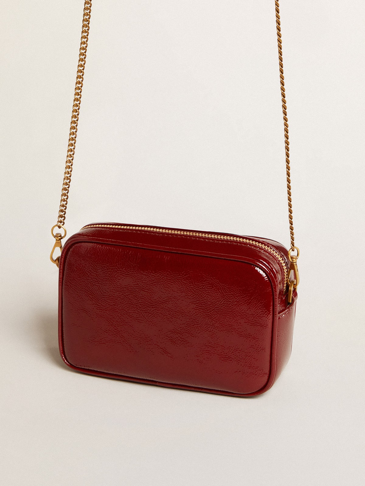 Golden Goose - Mini Star Bag in burgundy patent leather with tone-on-tone star in 