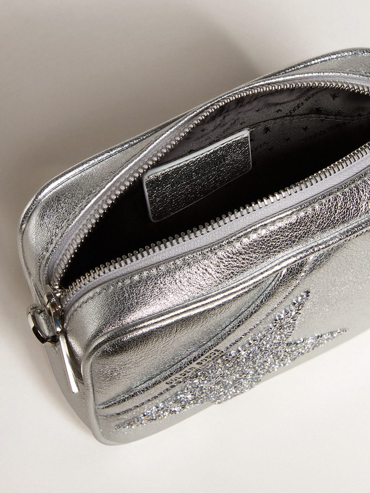 Mini Star Bag in silver metallic leather with Swarovski crystal star