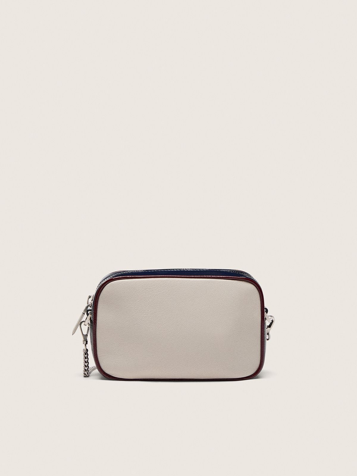 Mini Star Bag in butter-white leather with black star and burgundy and dark blue details