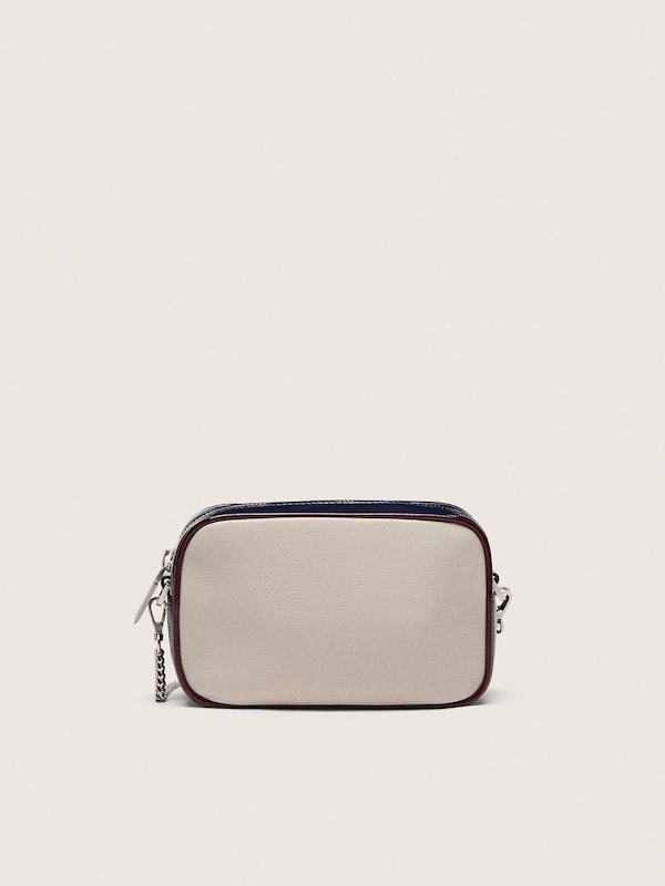 Butterwei&szlig;e Mini Star Bag aus Leder mit schwarzem Stern und Details in Bordeaux und Dunkelblau