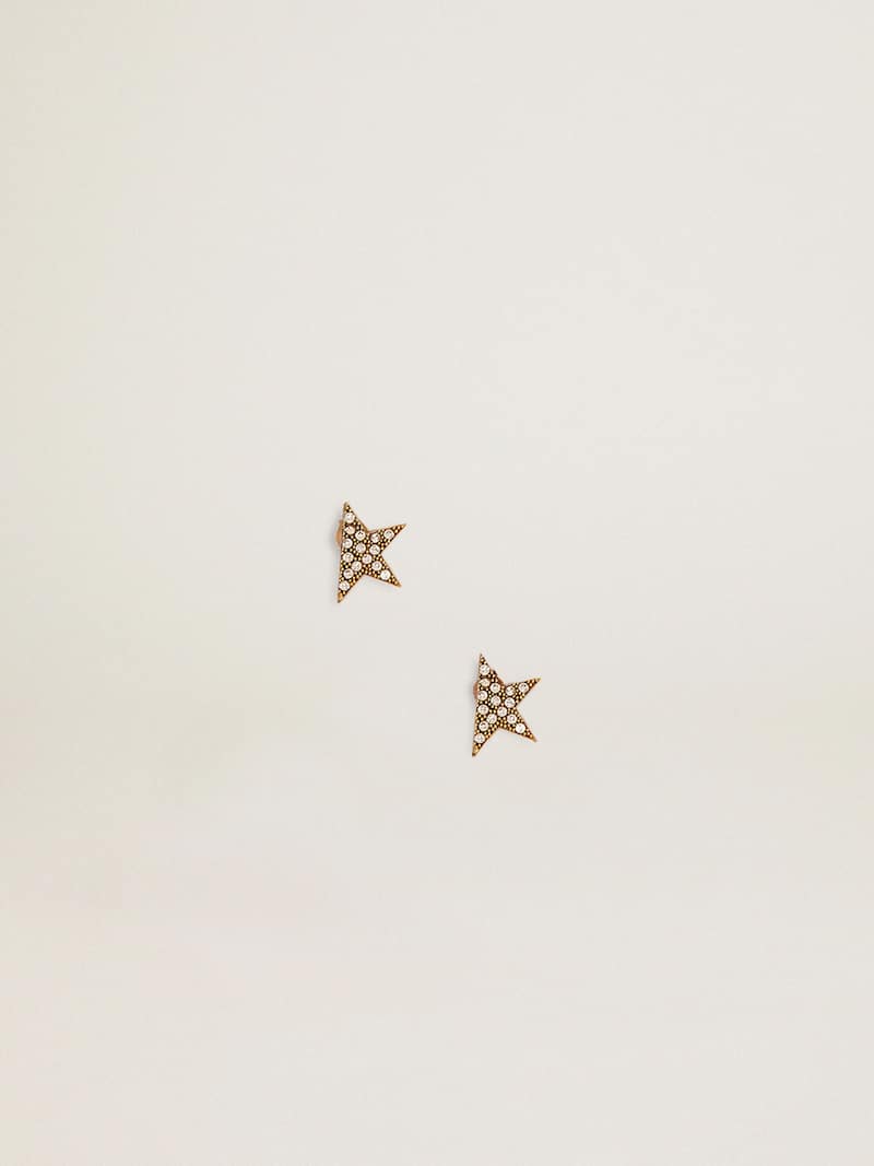 Women's stud earrings in antique gold color with crystals