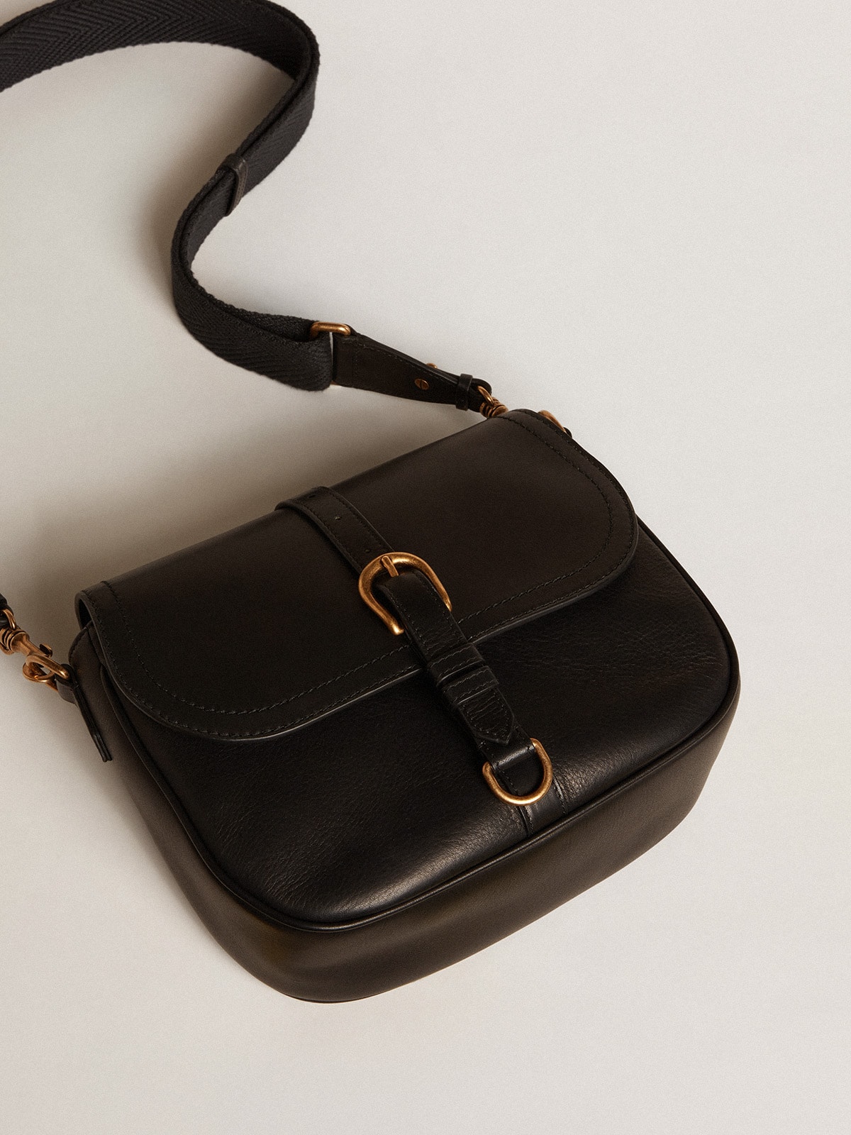 Medium Sally Bag in black leather with buckle and shoulder strap Golden Goose