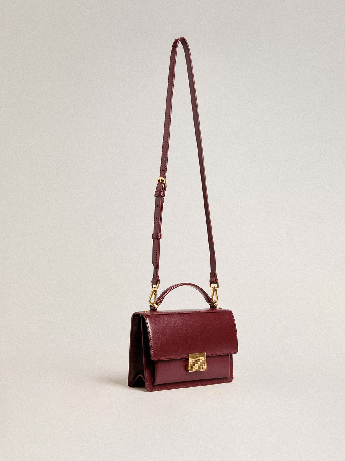 Golden Goose - Venezia Bag in burgundy boarded leather with gold details in 