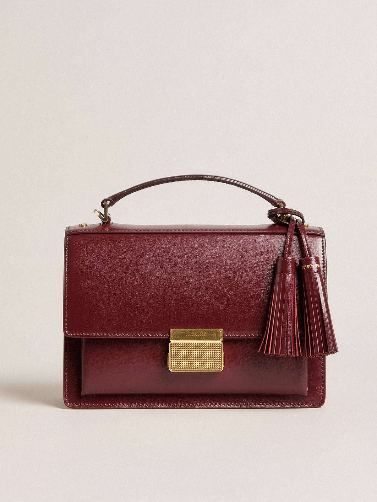 Golden Goose - Venezia Bag in burgundy boarded leather with gold details in 