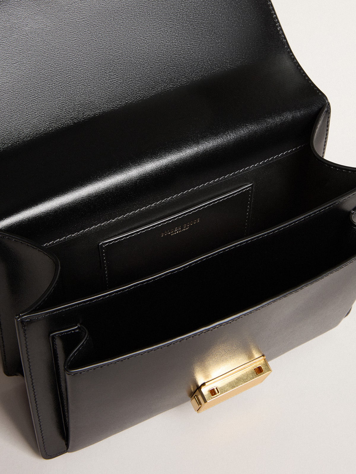 Golden Goose - Venezia Bag in black boarded leather with gold details in 