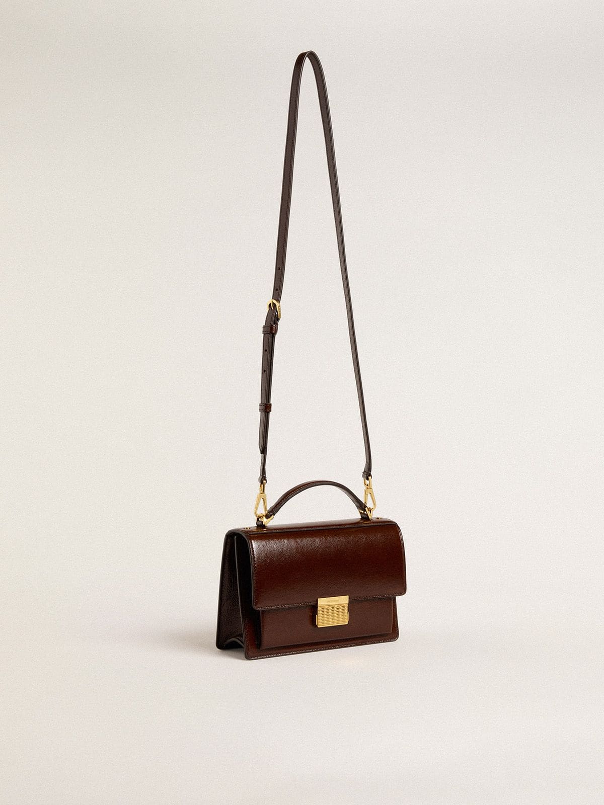 Venezia Bag in dark brown laminated leather with gold details 