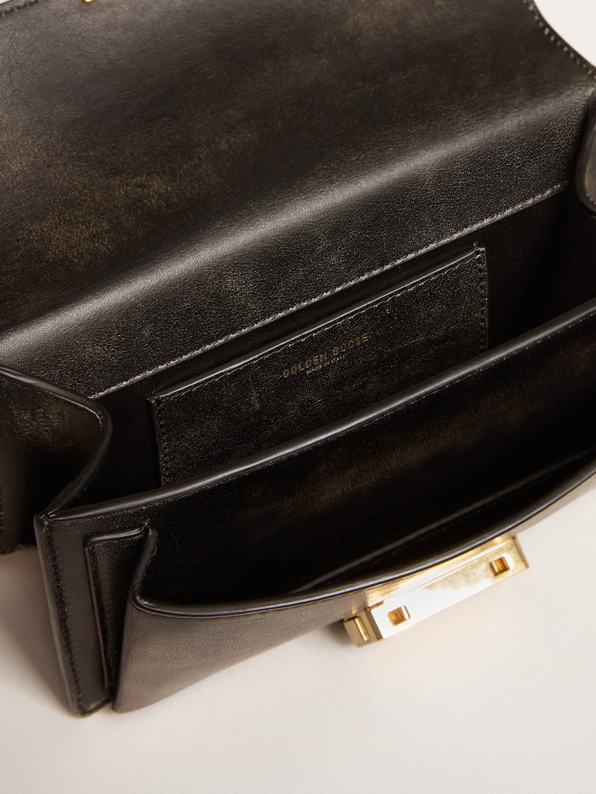 Golden Goose - Small Venezia Bag in black distressed leather with gold details in 