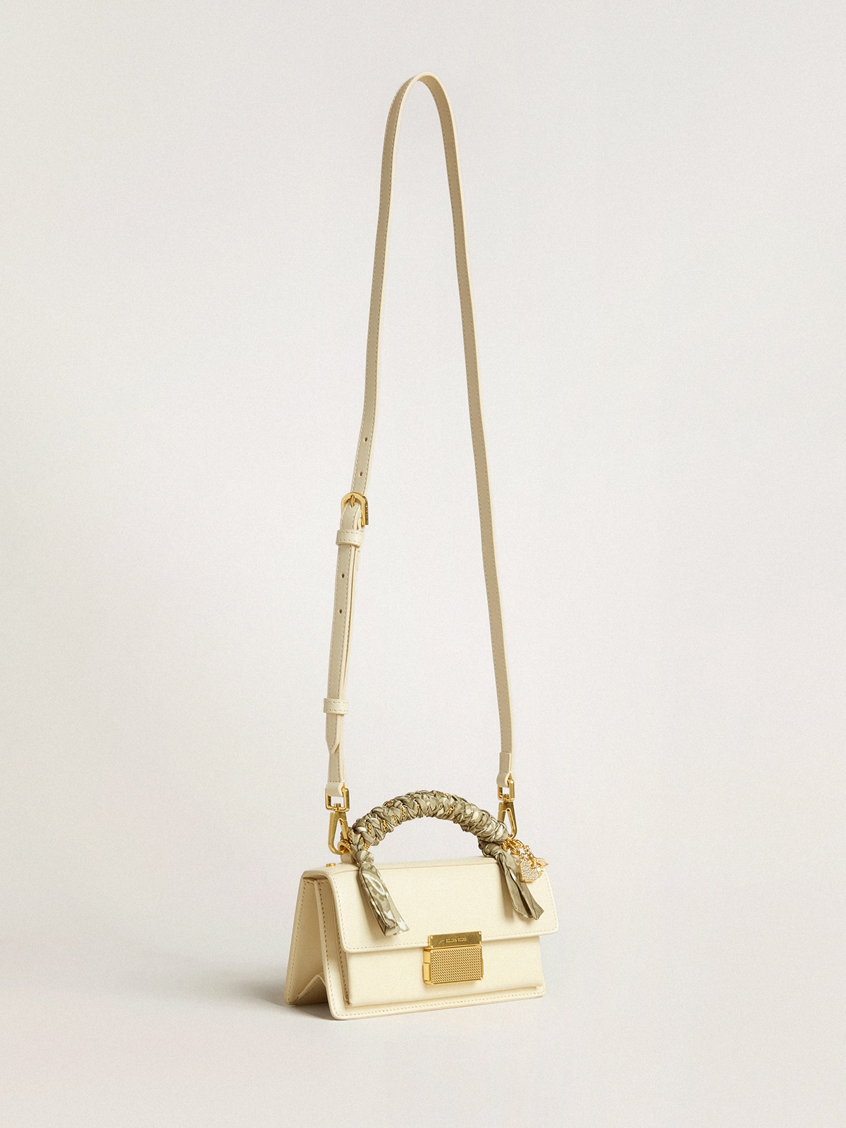 Small Venezia Bag in butter-colored boarded leather with braided scarf and double charm 