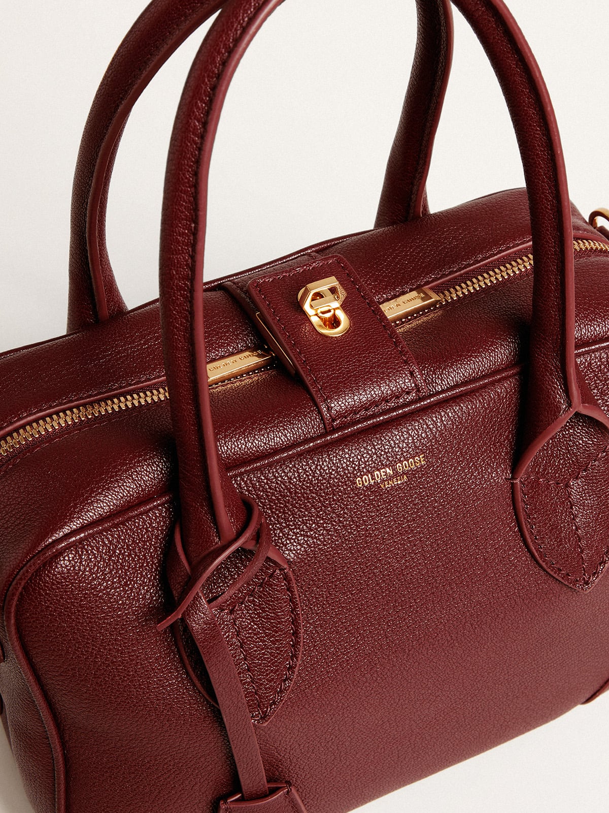 Vita Bag in burgundy sheepskin leather with gold details | Golden Goose