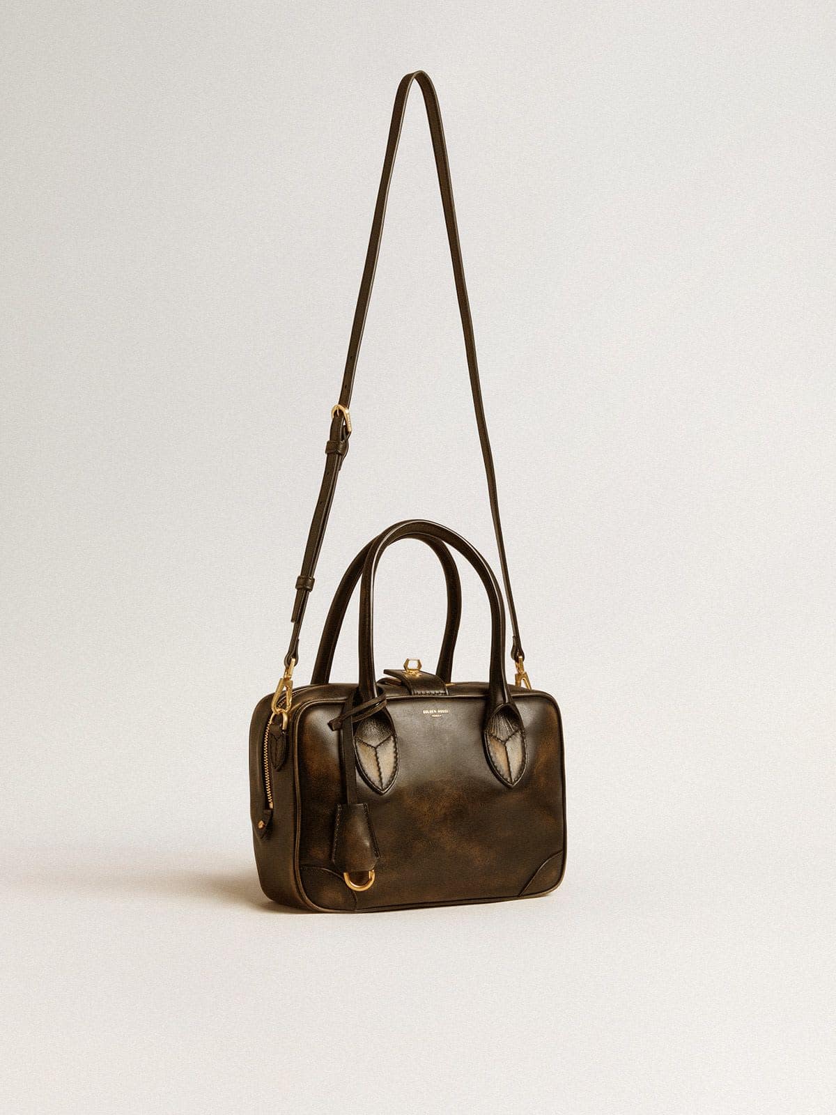 Vita Bag in black distressed leather with gold details