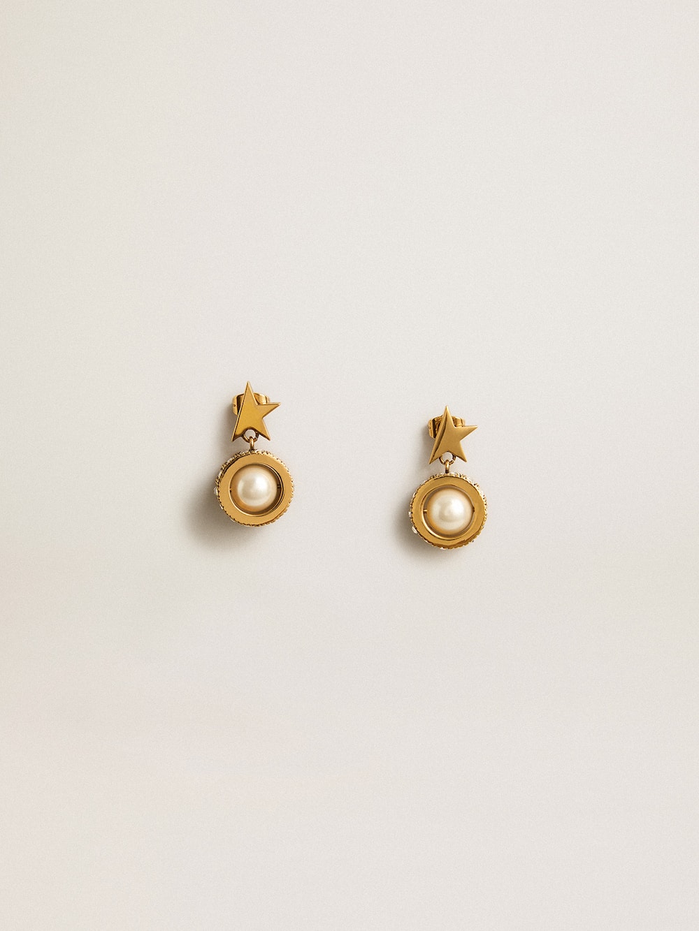 Golden Goose - Boucles d’oreilles dorées avec étoile et perle in 