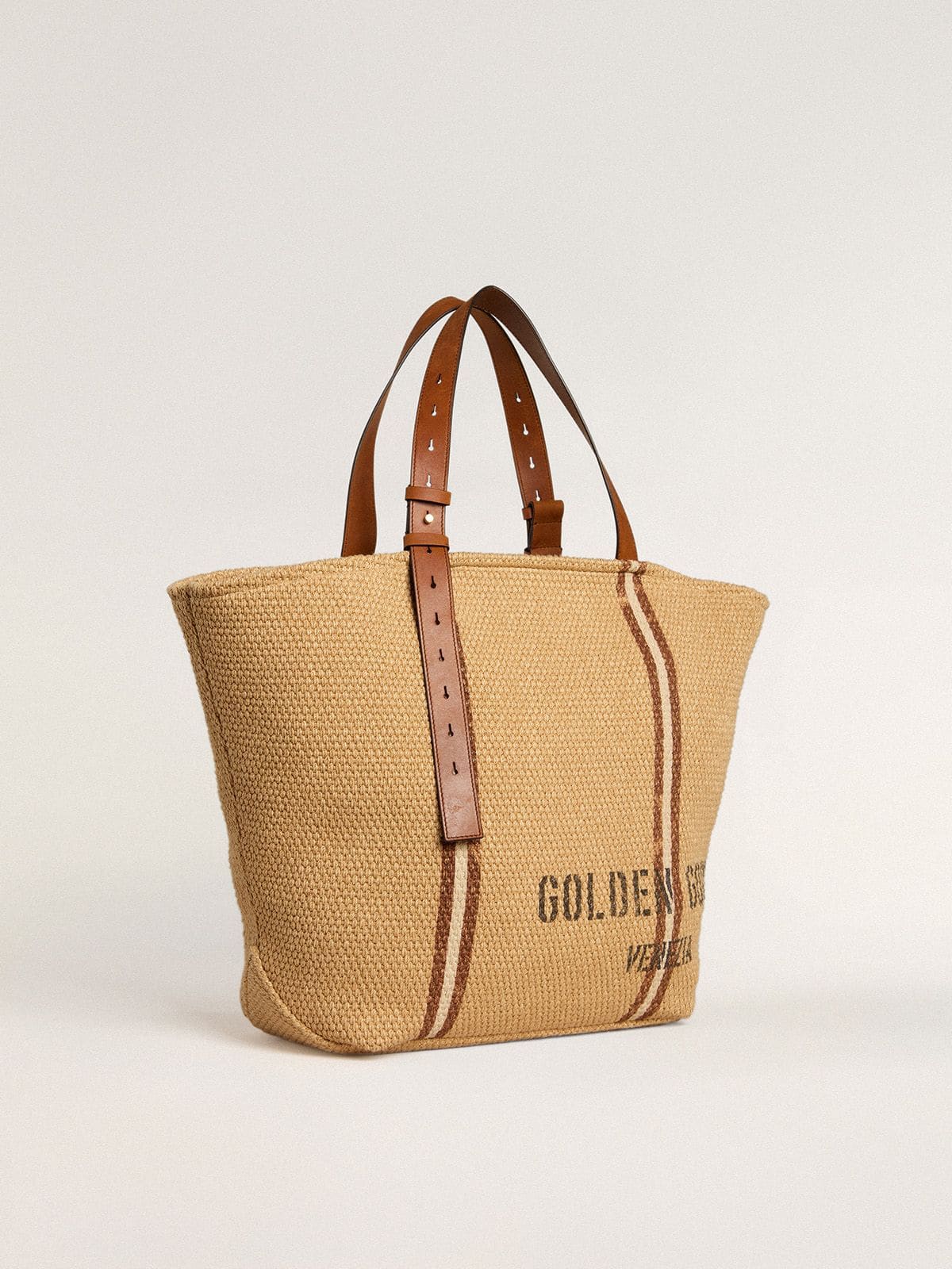 24.7 tote bag in natural raffia and brown leather with gold metallic details