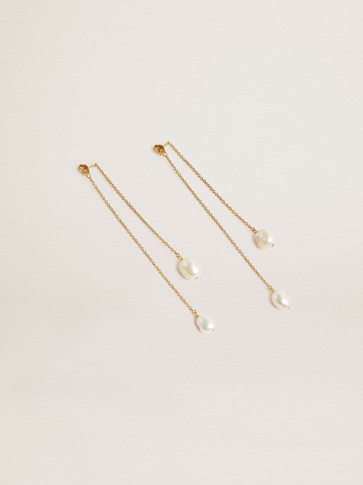 Boucles d’oreilles pendantes avec perles