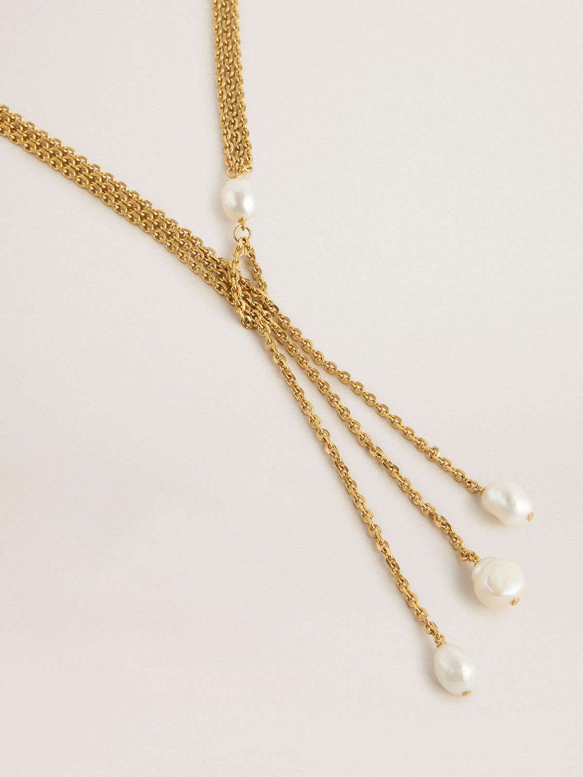 Collier en chaînes tressées or ancien avec perles