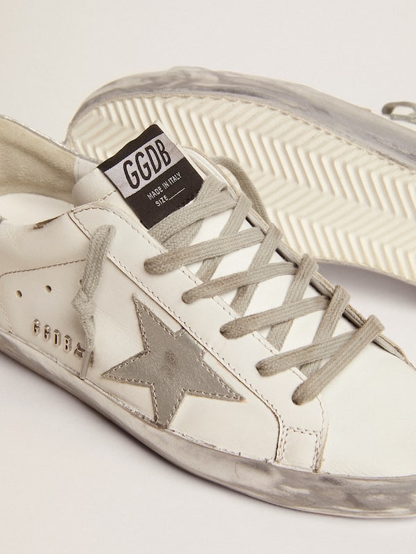 Golden Goose - Women's Super-Star with silver sparkle foxing and metal stud lettering in 