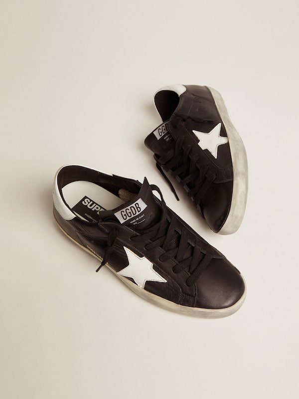 Golden Goose - Women’s Super-Star in black leather with white leather star and heel tab in 