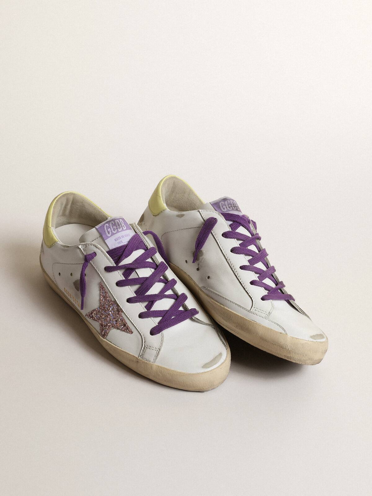 Golden Goose - White Super-Star sneakers with a glitter star and yellow heel tab in 