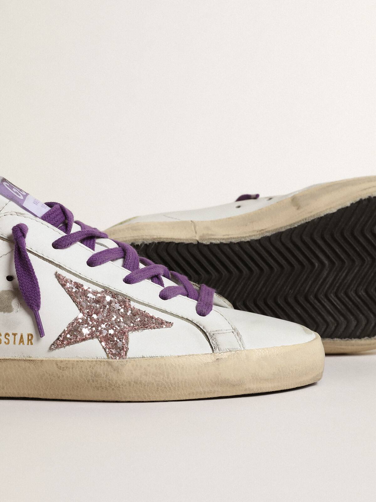 Golden Goose - White Super-Star sneakers with a glitter star and yellow heel tab in 