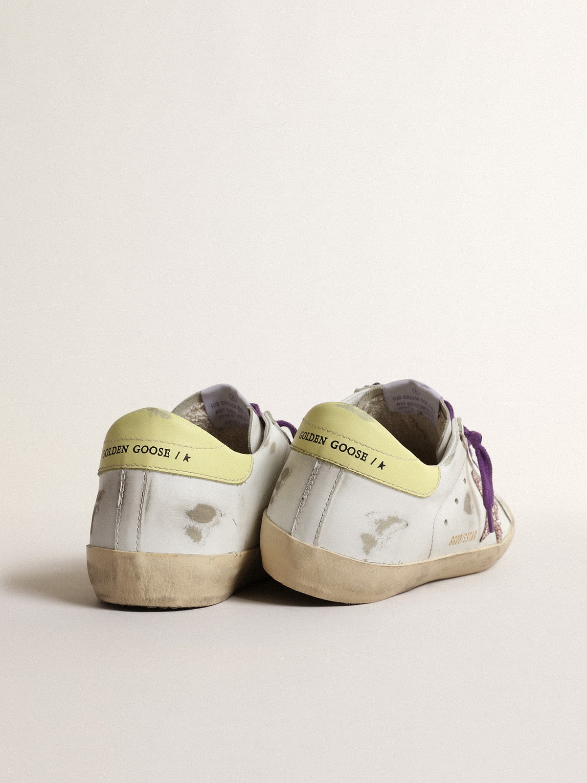 Golden Goose - White Super-Star sneakers with a glitter star and yellow heel tab in 