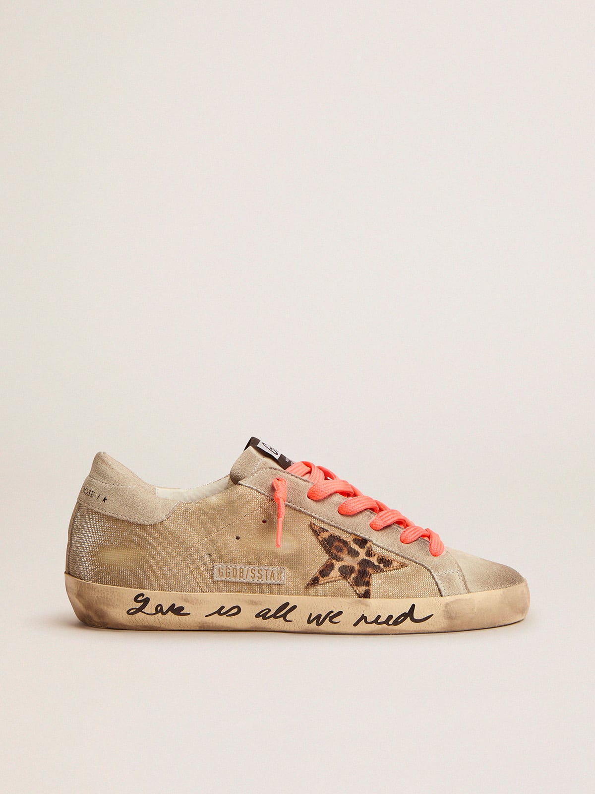 Golden Goose - Gold-colored Super-Star sneakers with checkered pattern and handwriting in 