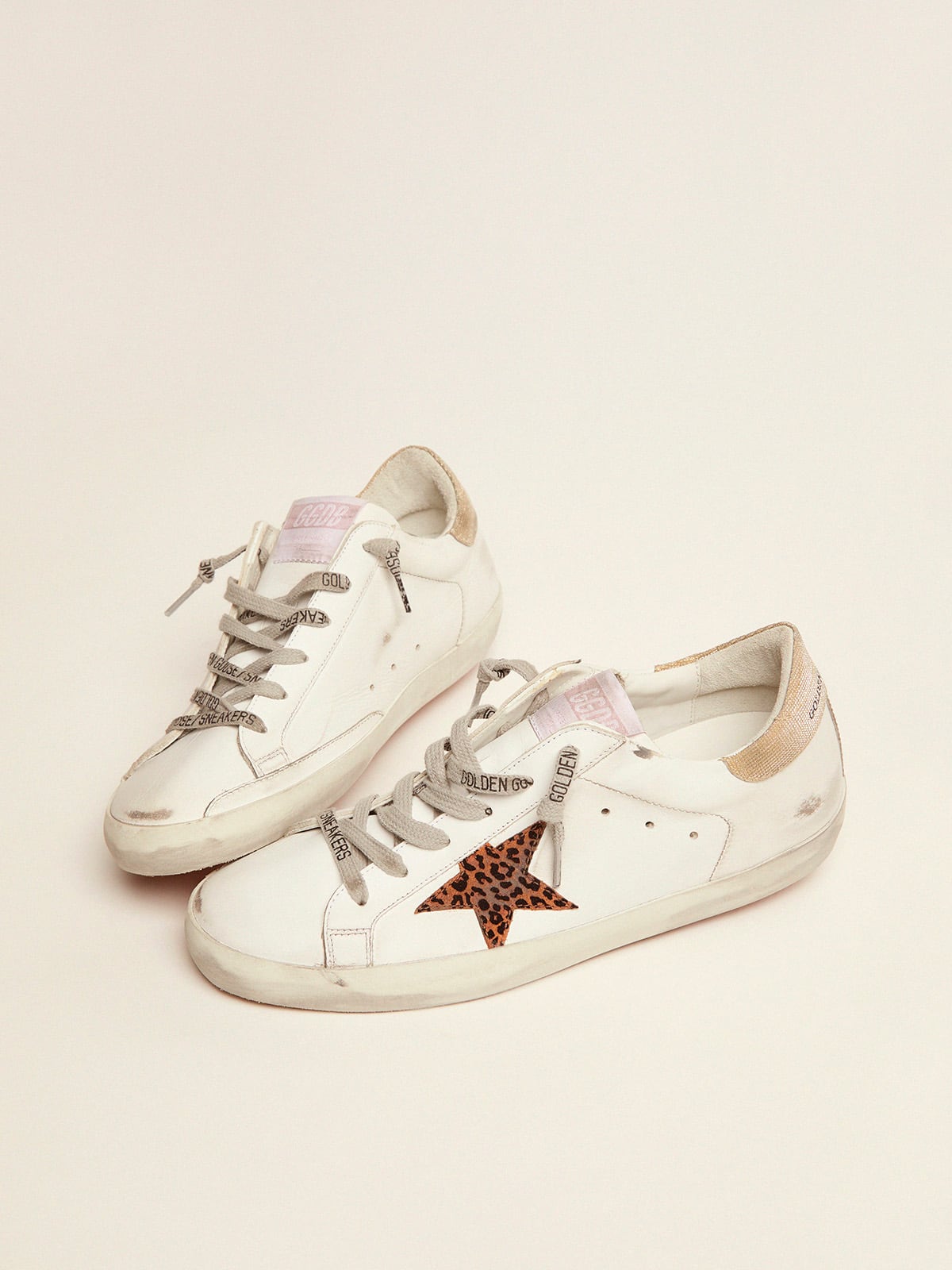 Golden Goose - Super-Star LTD sneakers with leopard-print star and gold glitter heel tab in 