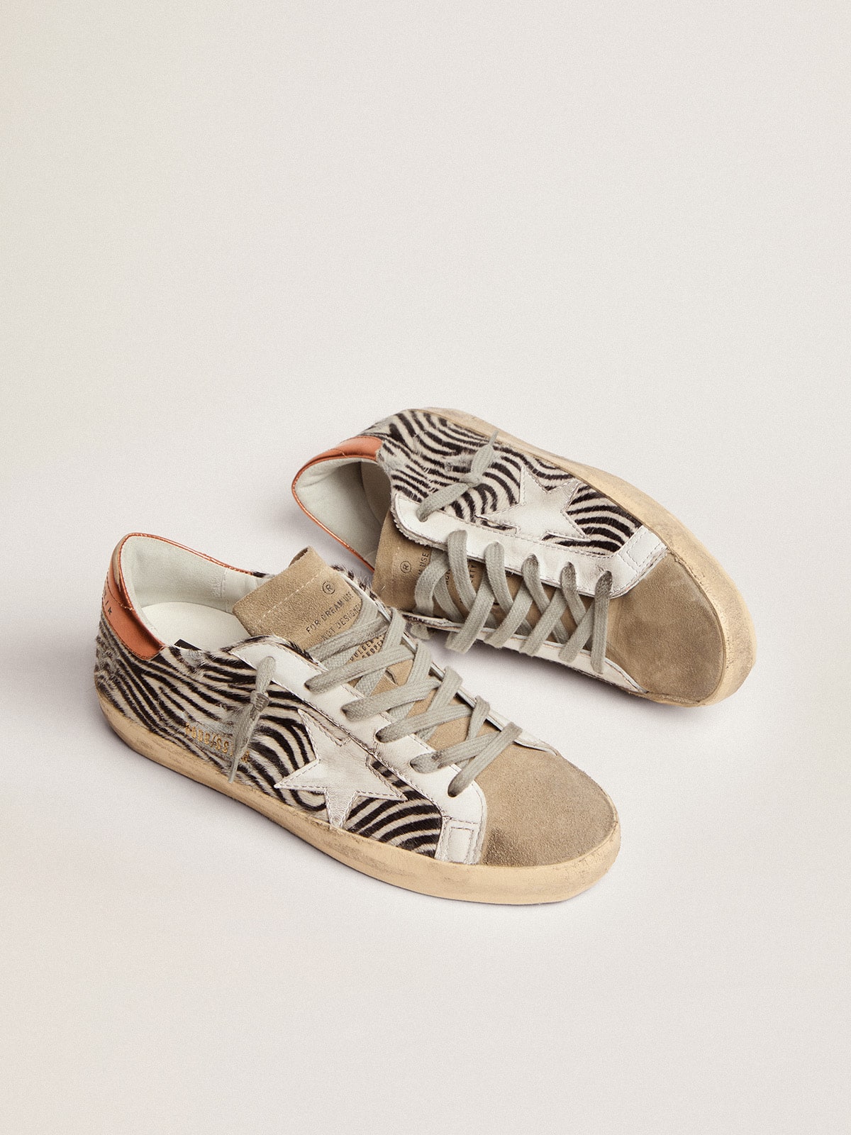 Golden Goose - Women's Super-Star LTD in zebra print pony skin with white star in 